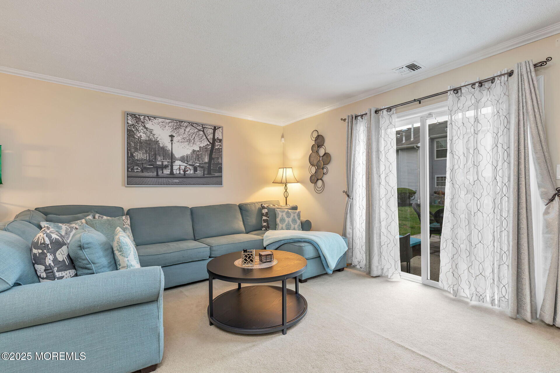 60 County Road, Unit F32 Cliffwood, NJ 07721 - Photo 11 of 31 a living room with furniture and a large window