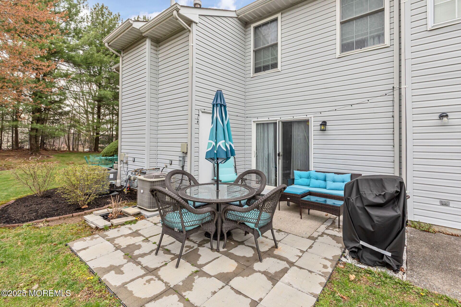 60 County Road, Unit F32 Cliffwood, NJ 07721 - Photo 25 of 31 a view of a house with backyard and sitting area