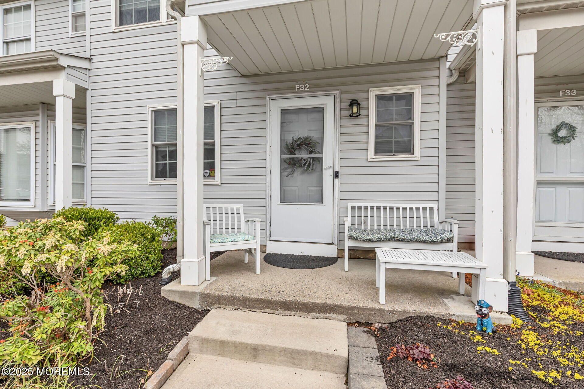 60 County Road, Unit F32 Cliffwood, NJ 07721 - Photo 30 of 31 a front view of a house with a garden