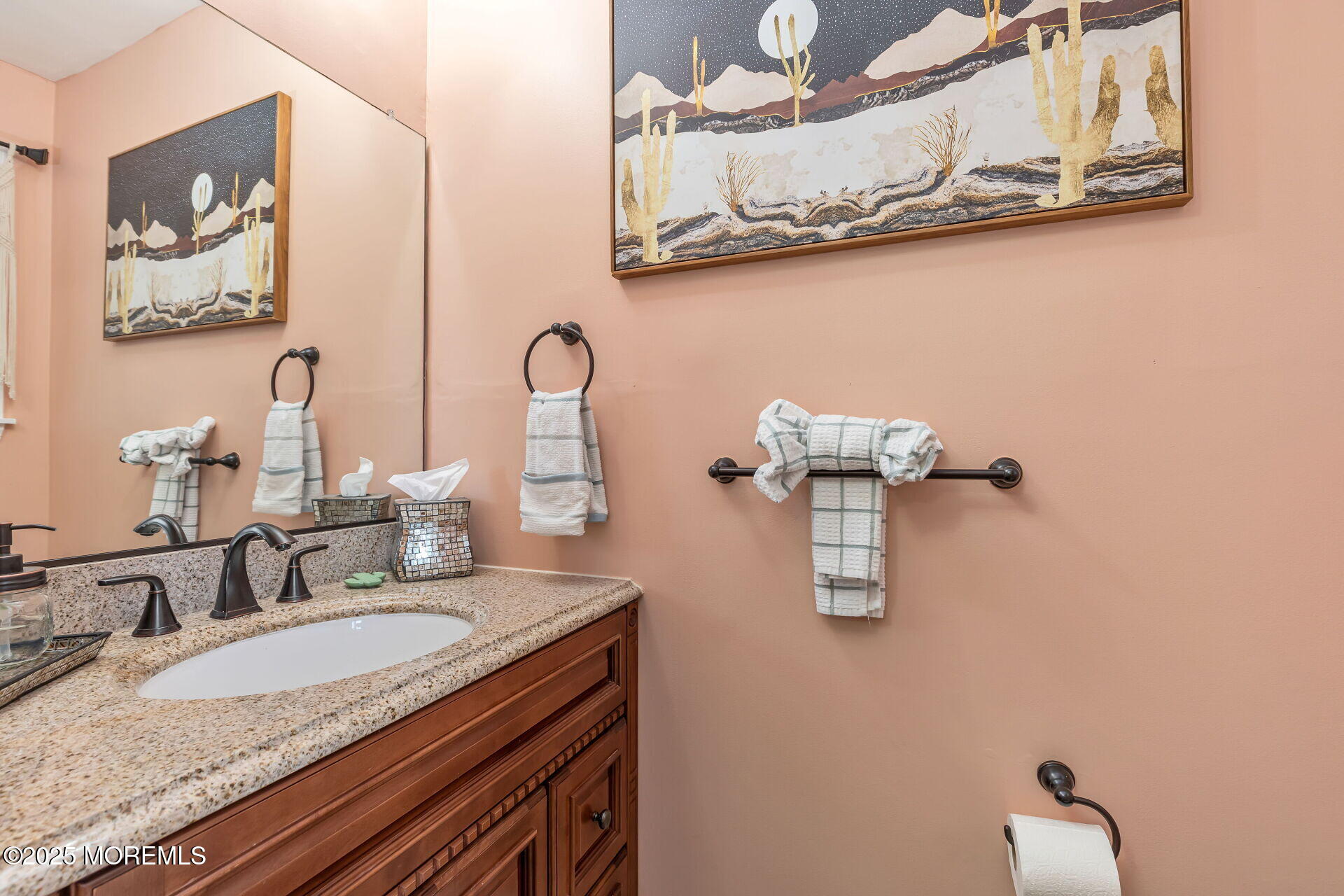60 County Road, Unit F32 Cliffwood, NJ 07721 - Photo 5 of 31 a bathroom with a granite countertop sink a mirror and vanity