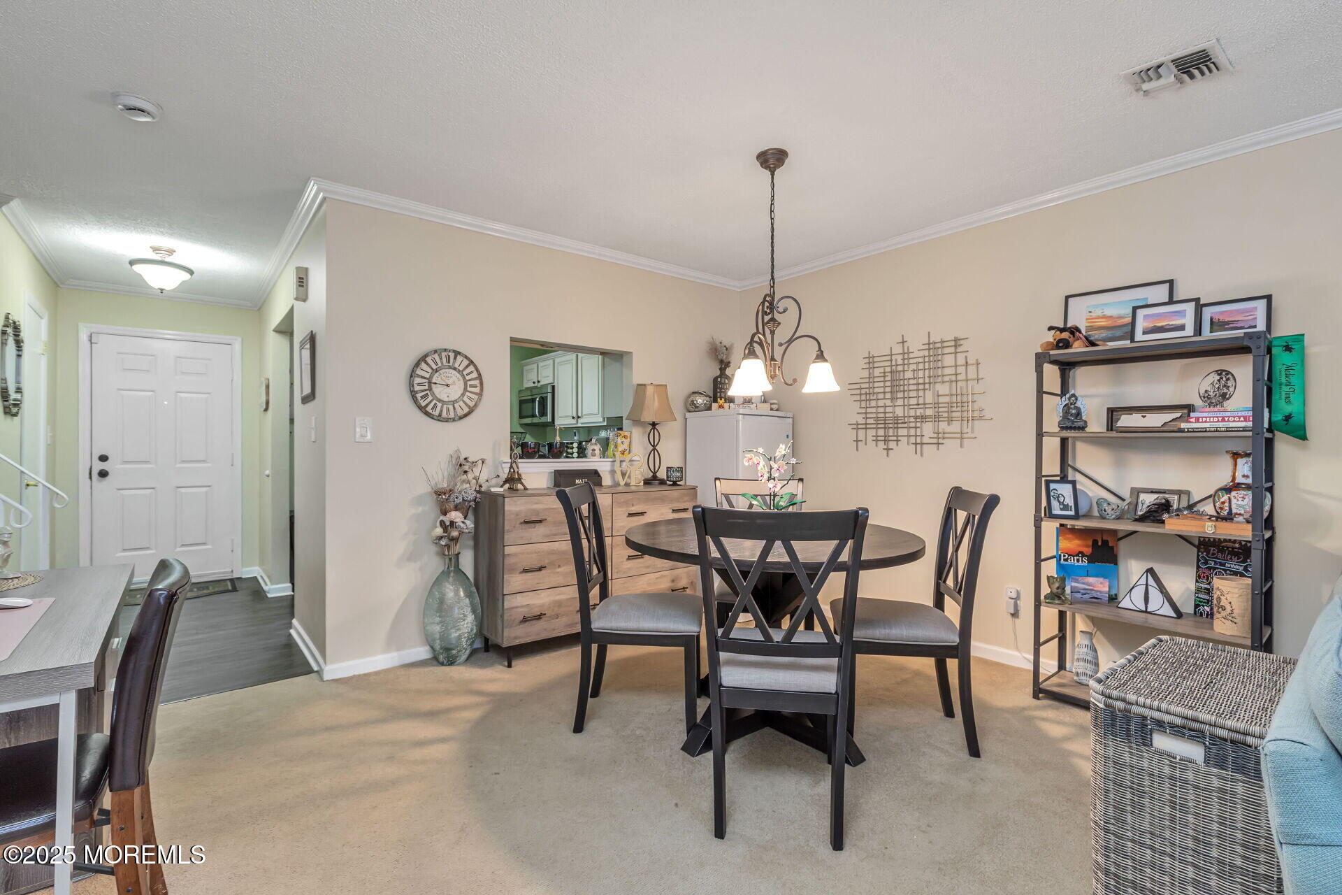 60 County Road, Unit F32 Cliffwood, NJ 07721 - Photo 7 of 31 a view of a dining room with furniture