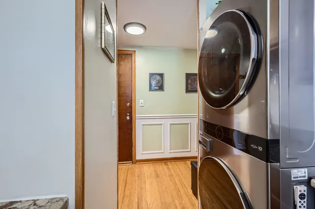 a view of a hallway with washer and dryer