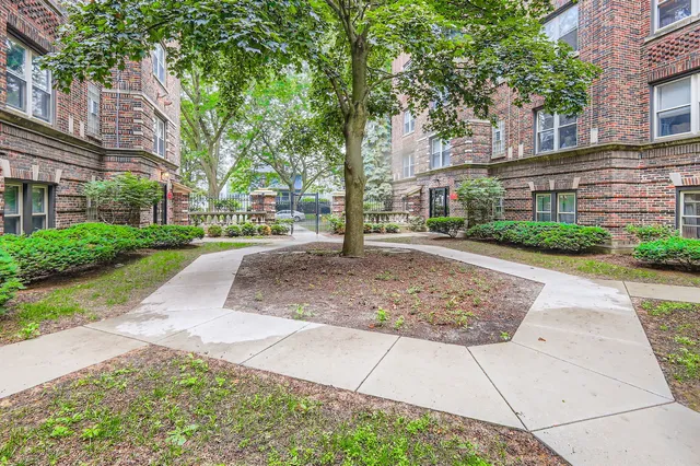 a view of car parked on the side of the road