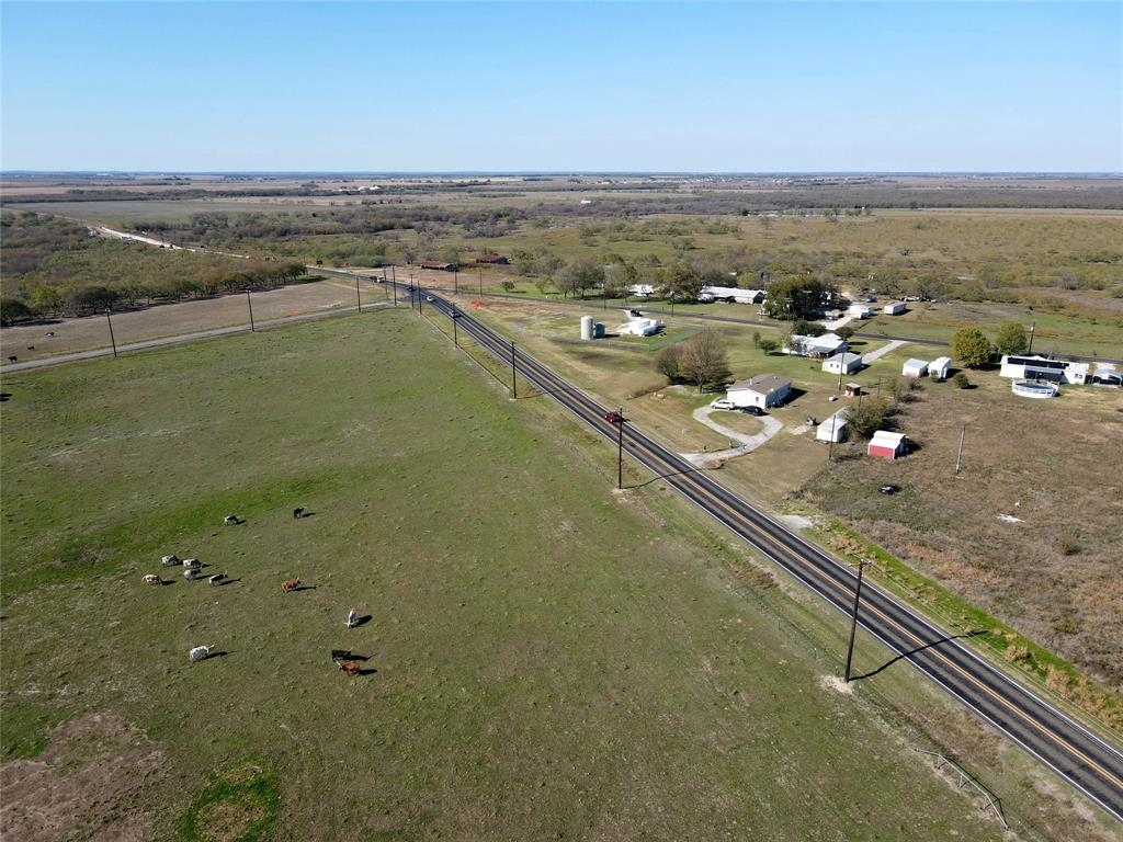 16531 Farm To Market 455 Pilot Point, TX 76258 - Photo 16 of 37 Aerial view of property and surrounding area featuring rural landscape
