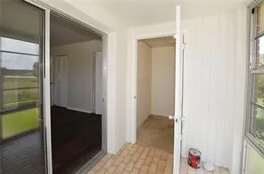 a view of hallway with a small space