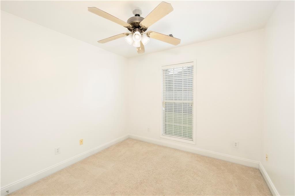 8 Ridgebrook Drive Phenix City, AL 36869 - Photo 16 of 21 Unfurnished room with light colored carpet and ceiling fan