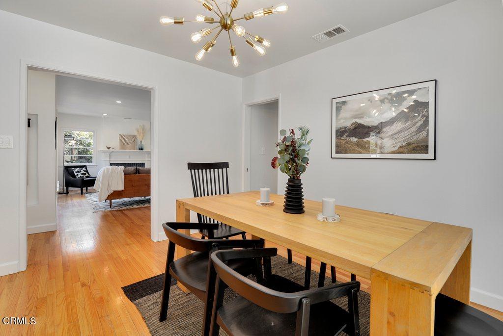 1323 Brampton Road Los Angeles, CA 90041 - Photo 11 of 44 a view of a dining room with furniture and wooden floor