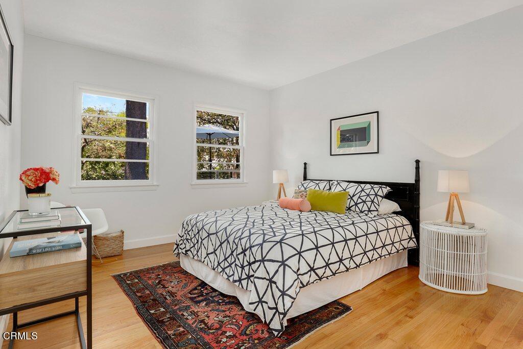 1323 Brampton Road Los Angeles, CA 90041 - Photo 13 of 44 a bedroom with a bed a painting on the wall and a dresser