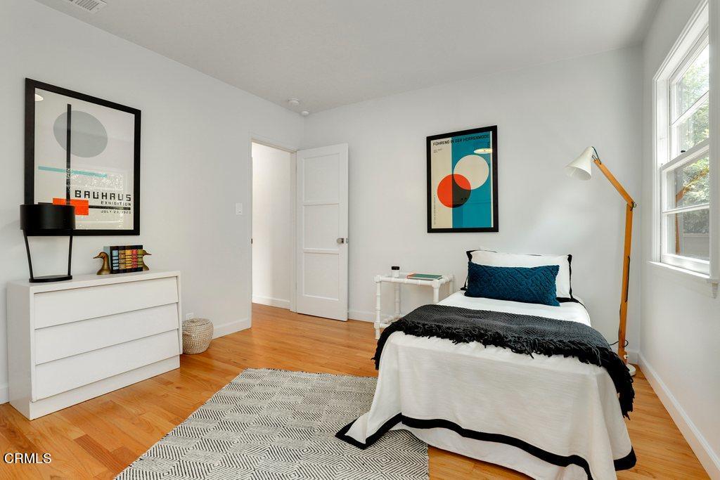 1323 Brampton Road Los Angeles, CA 90041 - Photo 19 of 44 a bedroom with a bed and dresser