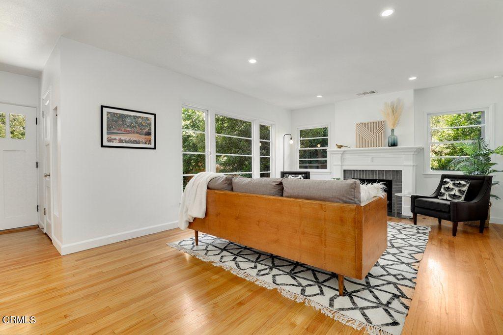1323 Brampton Road Los Angeles, CA 90041 - Photo 3 of 44 a living room with furniture and a fireplace