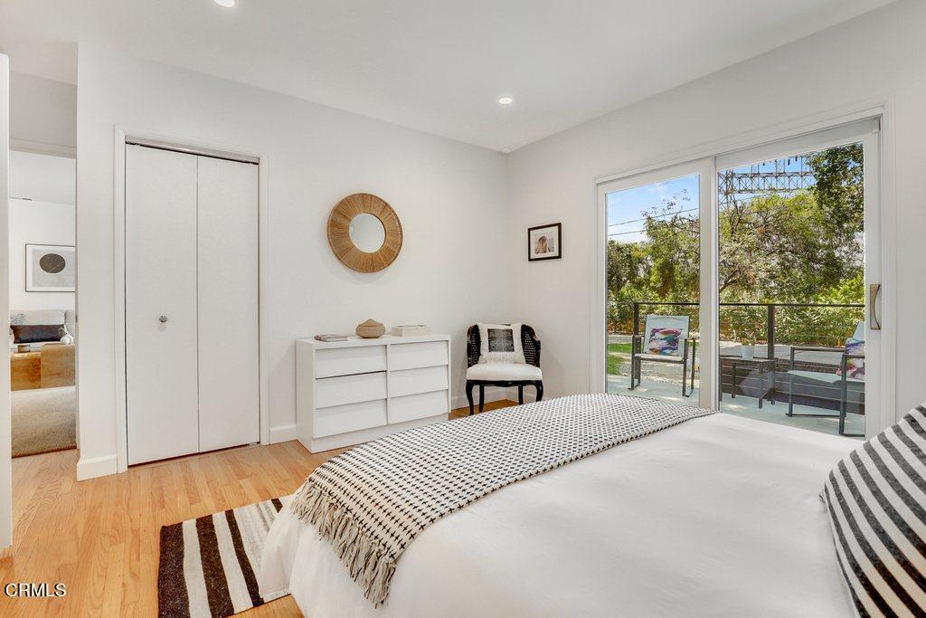 1323 Brampton Road Los Angeles, CA 90041 - Photo 25 of 44 a bedroom with a bed and a large window