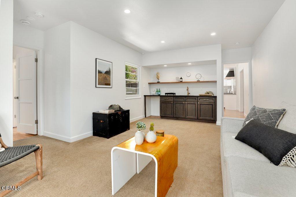1323 Brampton Road Los Angeles, CA 90041 - Photo 26 of 44 a living room with furniture and a flat screen tv