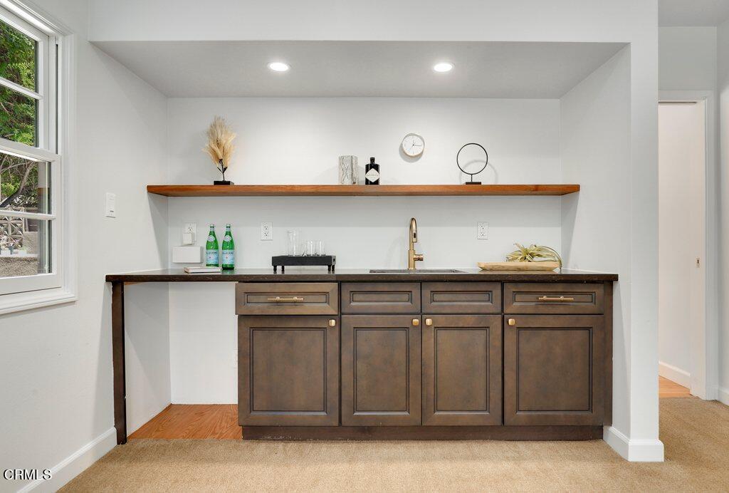 1323 Brampton Road Los Angeles, CA 90041 - Photo 28 of 44 a kitchen with stainless steel appliances granite countertop a sink and cabinets