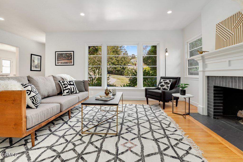 1323 Brampton Road Los Angeles, CA 90041 - Photo 4 of 44 a living room with furniture and a fireplace