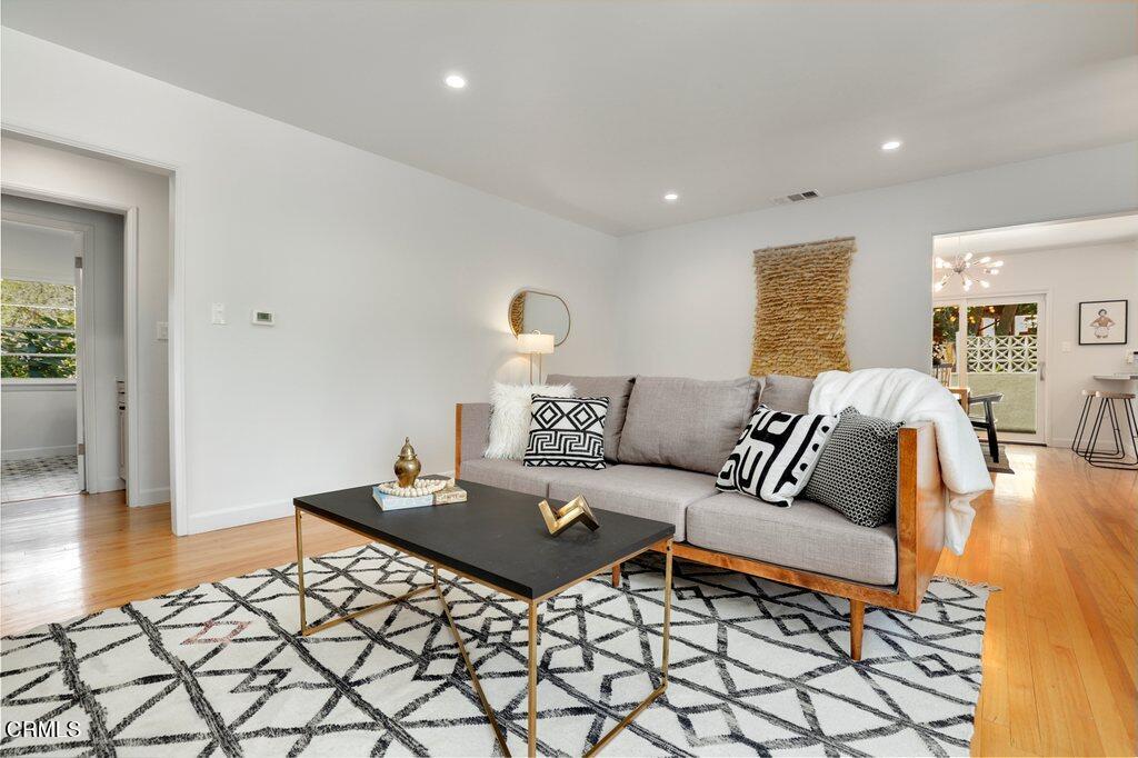 1323 Brampton Road Los Angeles, CA 90041 - Photo 5 of 44 a living room with a couch and wooden floor