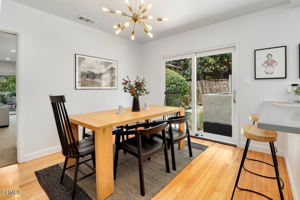1323 Brampton Road Los Angeles, CA 90041 - Photo 6 of 44 a view of a dining room with furniture window and wooden floor