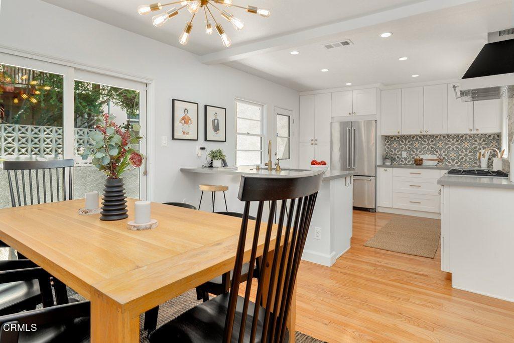 1323 Brampton Road Los Angeles, CA 90041 - Photo 7 of 44 a kitchen with a table and chairs in it