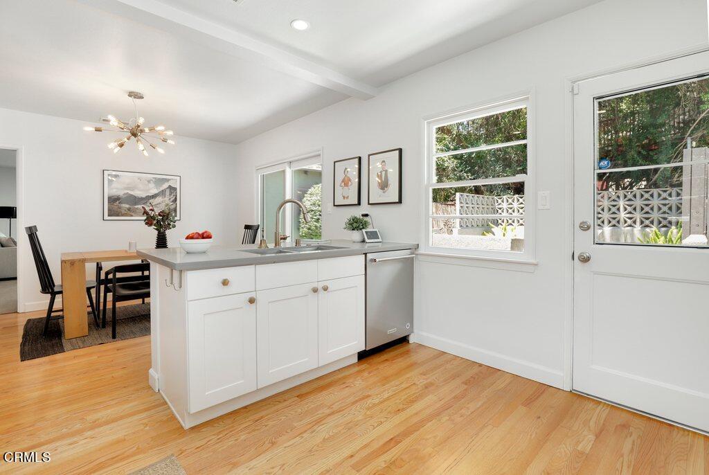 1323 Brampton Road Los Angeles, CA 90041 - Photo 10 of 44 a kitchen with a sink cabinets and window