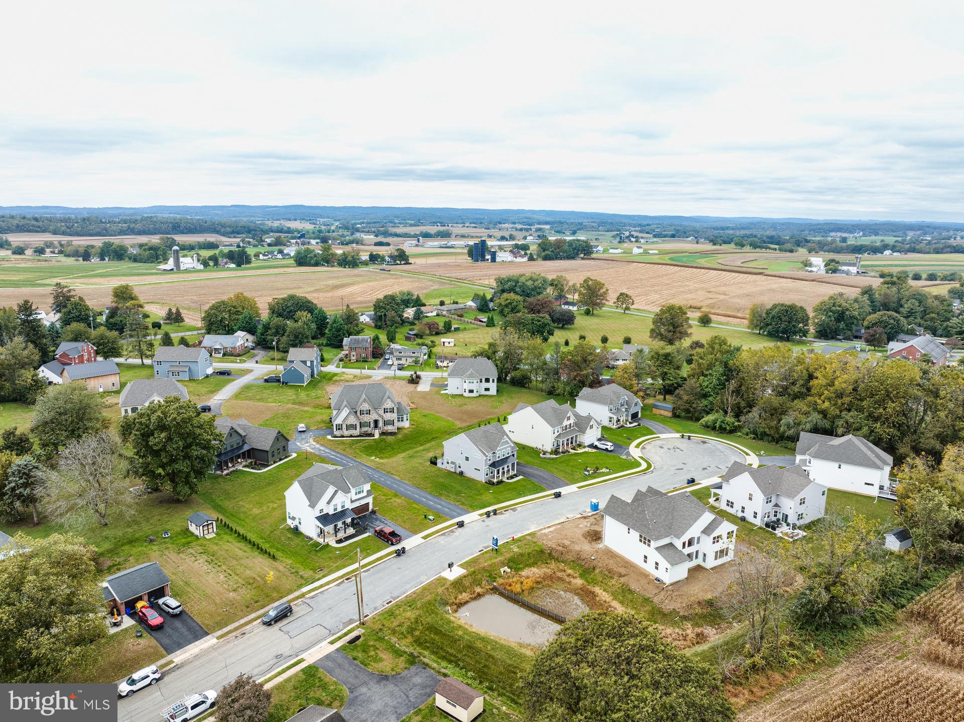 350 Village Road, Unit SEBASTIAN Strasburg, PA 17579 - Photo 19 of 20 an aerial view of a city and mountain view in back