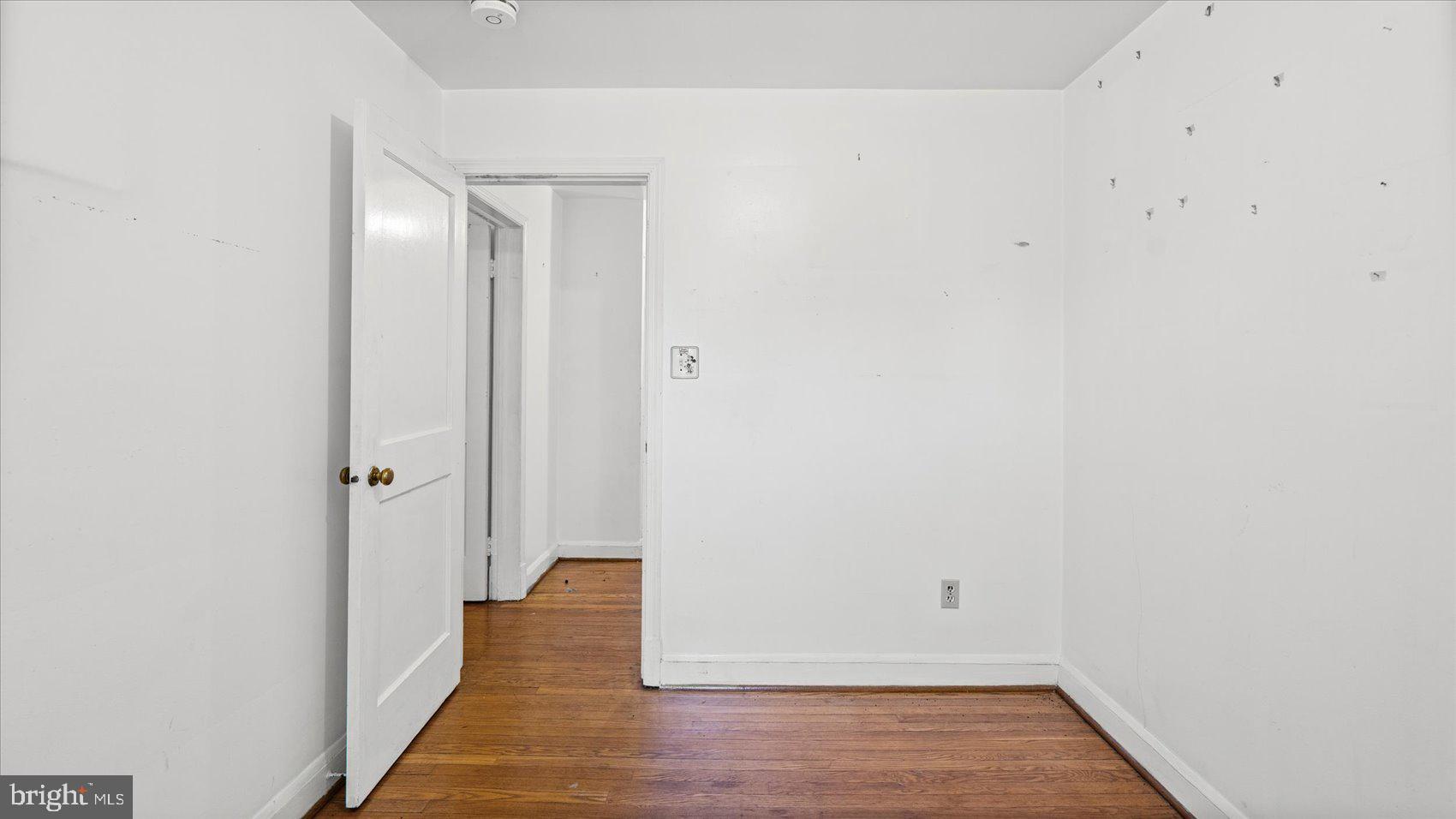 1805 Crestview Road Baltimore, MD 21239 - Photo 27 of 39 a view of a room with wooden floor