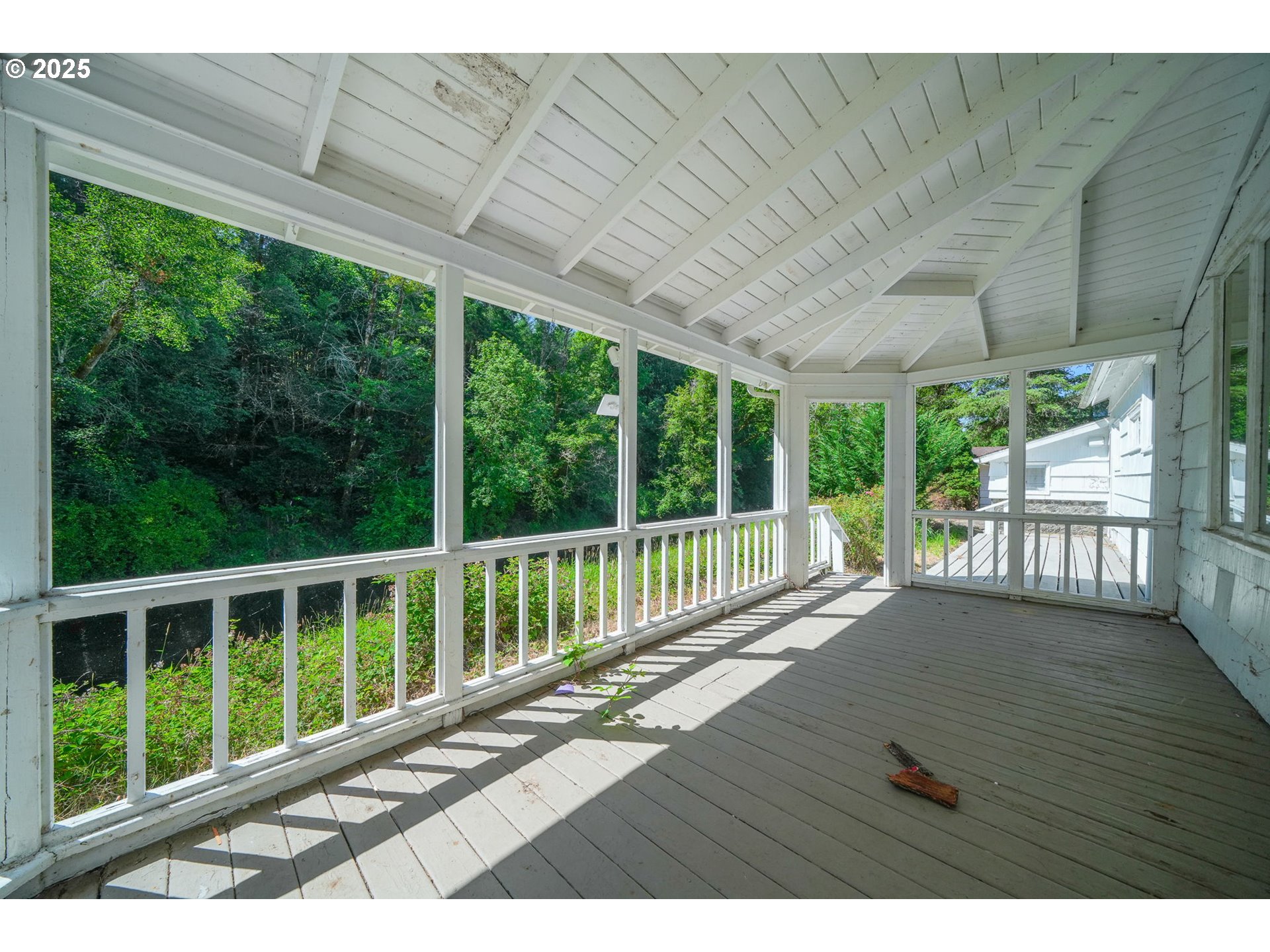 90450 Deadwood Creek Road Deadwood, OR 97430 - Photo 14 of 47 a view of balcony with wooden floor