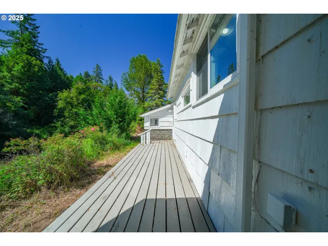 a view of balcony with wooden floor