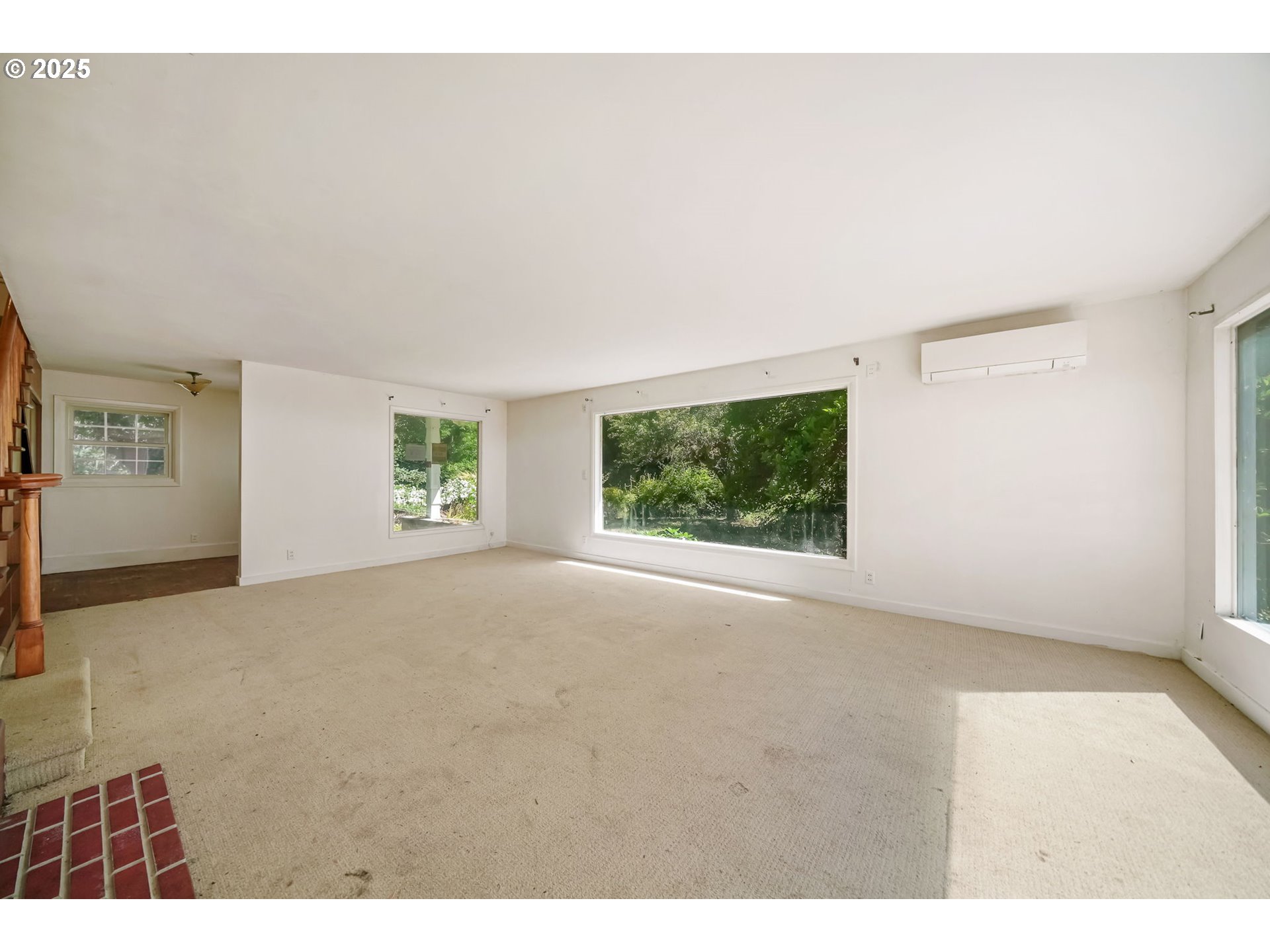 90450 Deadwood Creek Road Deadwood, OR 97430 - Photo 21 of 47 a view of a big room with windows and chandelier