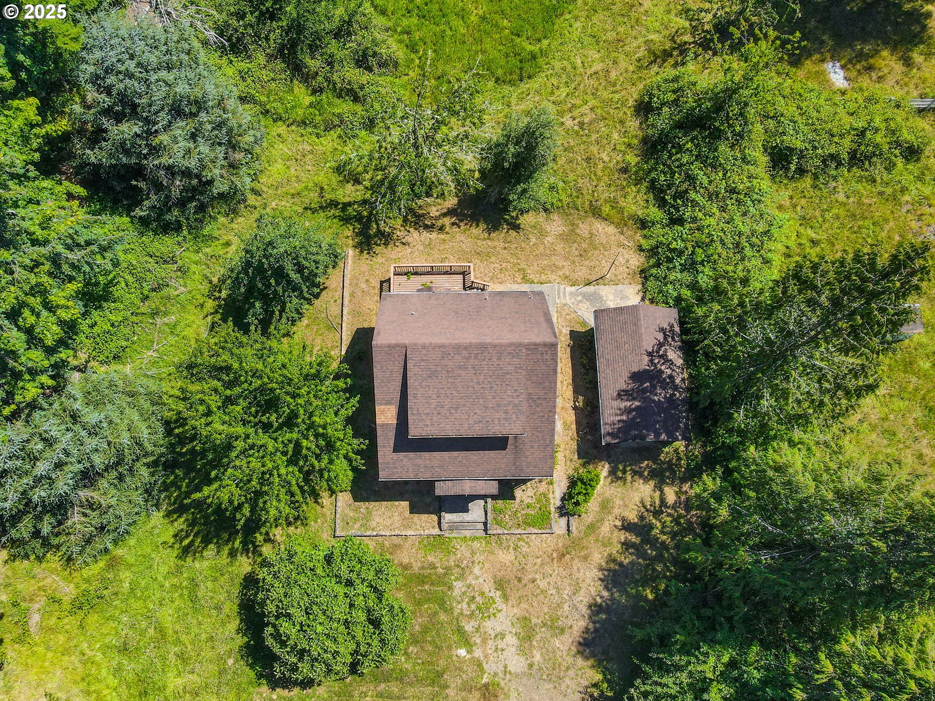90450 Deadwood Creek Road Deadwood, OR 97430 - Photo 35 of 47 an aerial view of a house with a yard basket ball court and outdoor seating