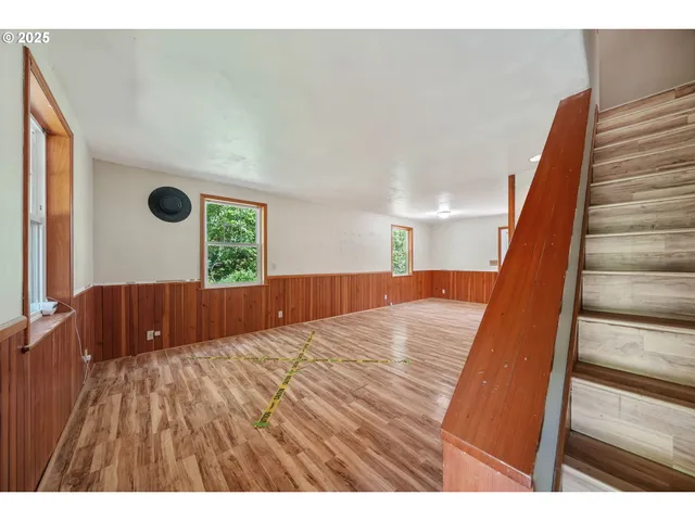 a view of a living room and front door