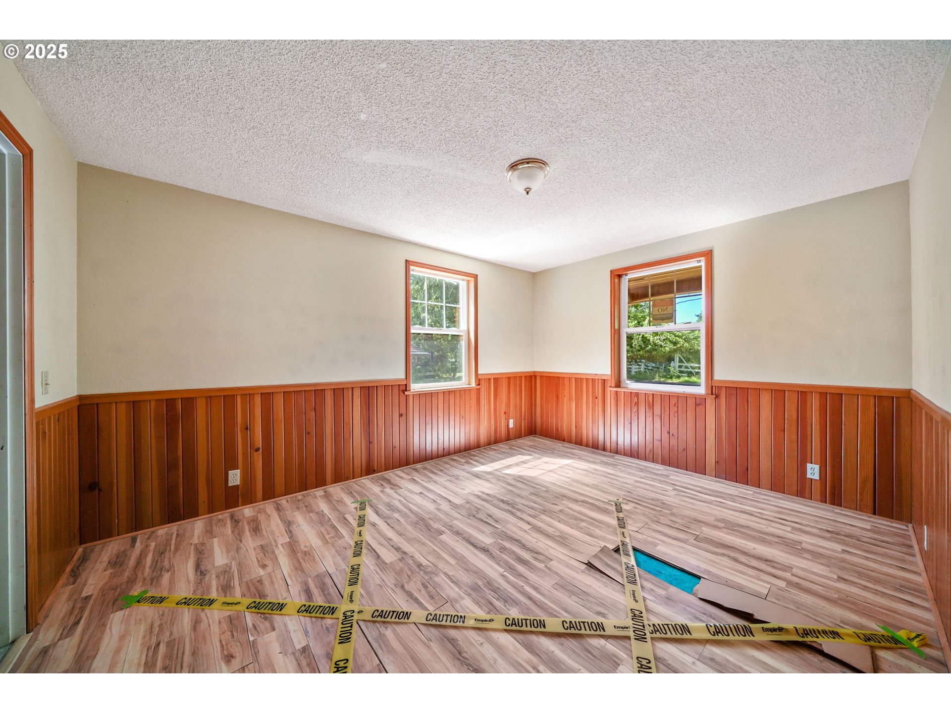 90450 Deadwood Creek Road Deadwood, OR 97430 - Photo 40 of 47 a view of an empty room with wooden floor and a window