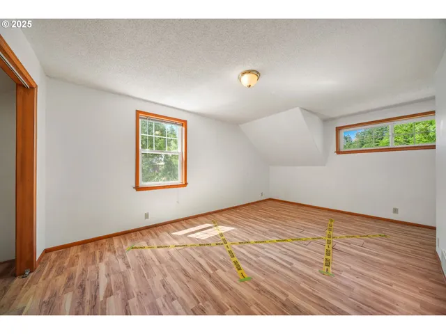 a view of an empty room and window