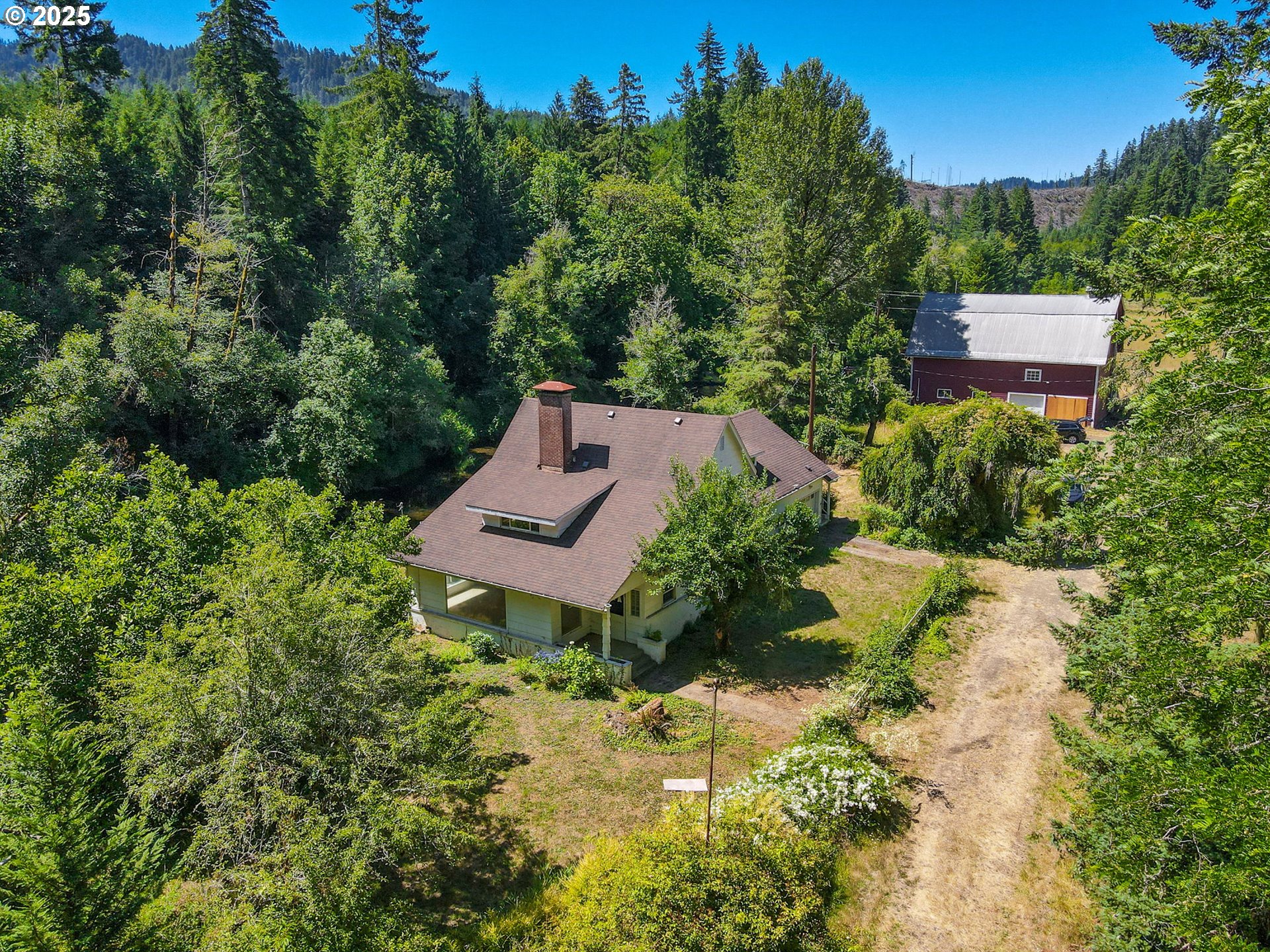 90450 Deadwood Creek Road Deadwood, OR 97430 - Photo 10 of 47 a garden view with a seating space