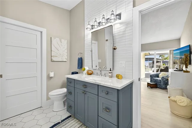 a view of bathroom with a sink toilet and shower
