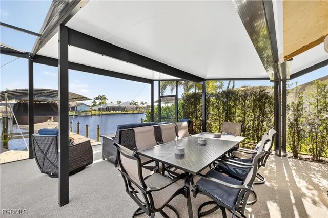 a view of a city from a dining room with furniture window and outside view