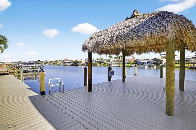 a view of a swimming pool with sitting area