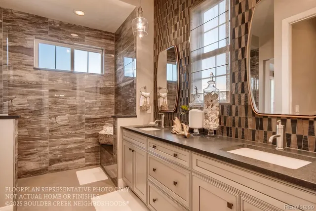 a bathroom with a double vanity sink mirror and