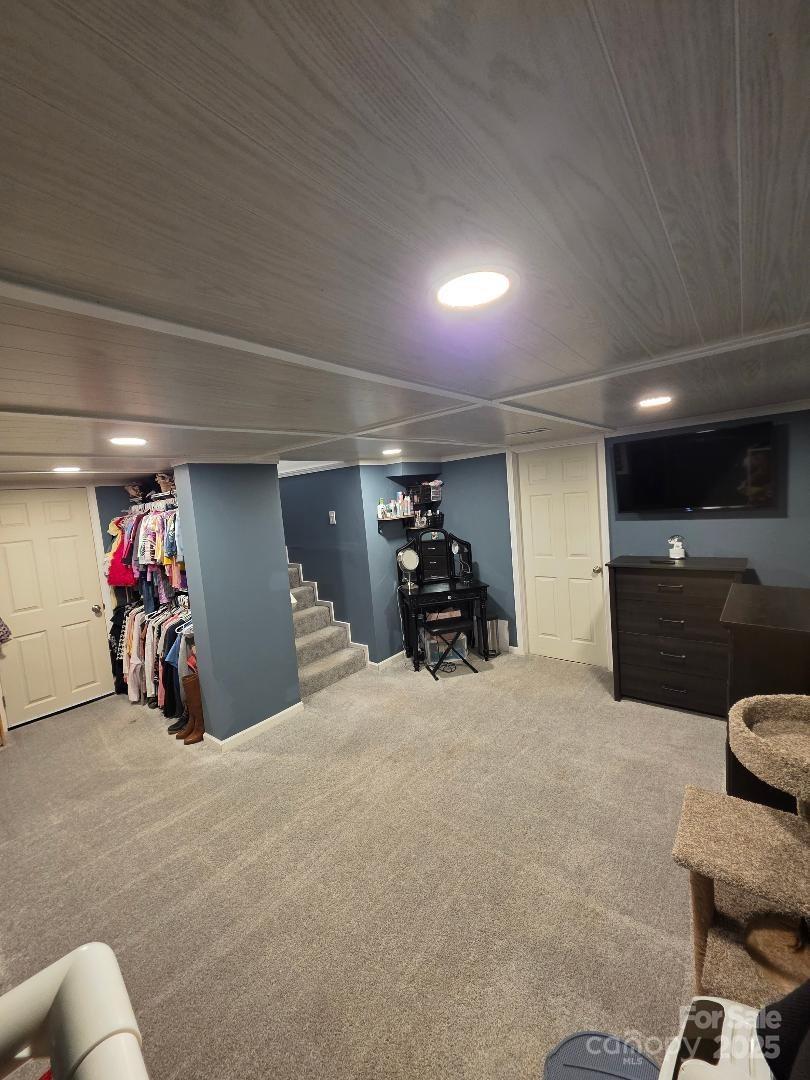 26 Azalea Road Arden, NC 28704 - Photo 14 of 26 a view of a garage with a bike and car