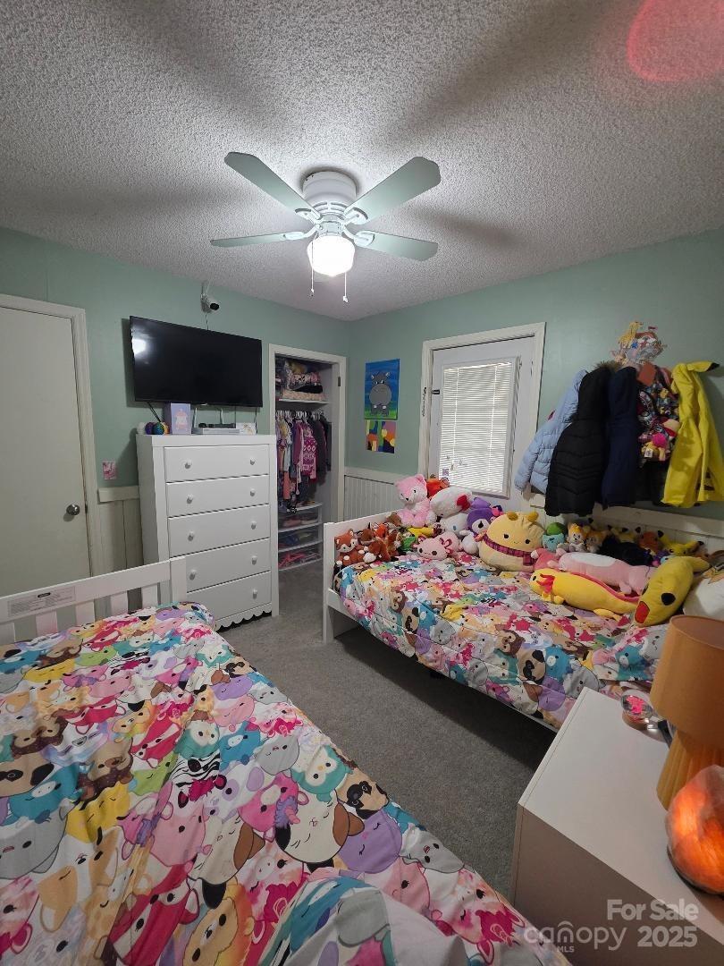 26 Azalea Road Arden, NC 28704 - Photo 22 of 26 a bedroom with bed and window