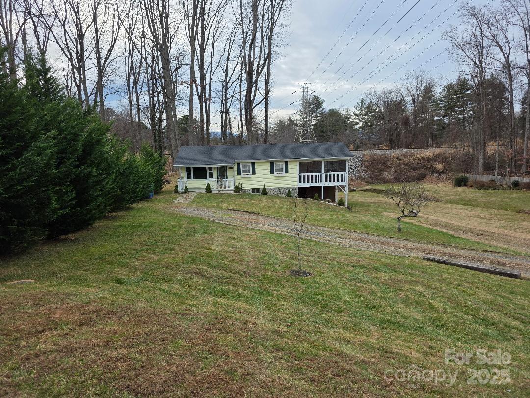 26 Azalea Road Arden, NC 28704 - Photo 5 of 26 a view of a backyard