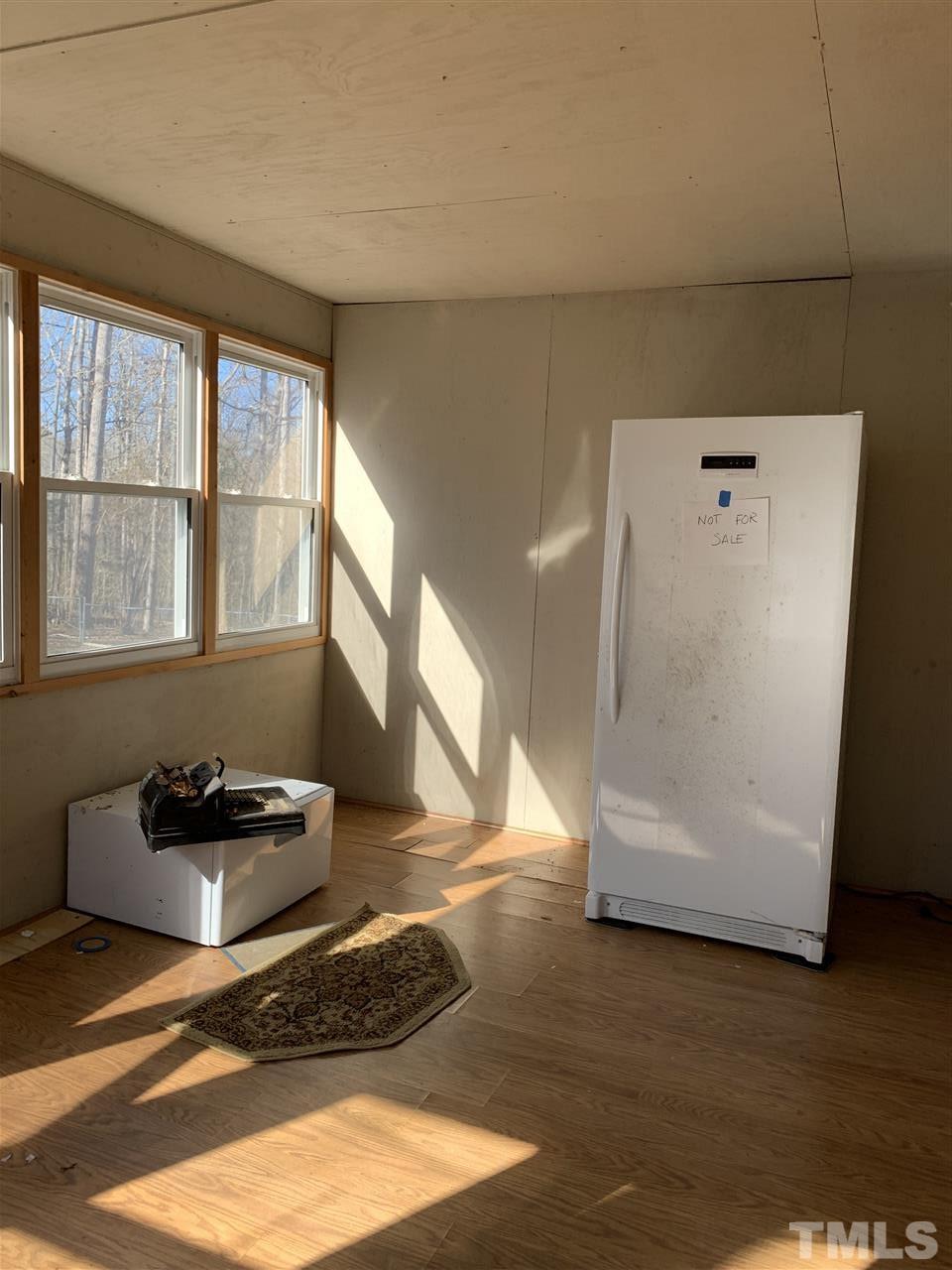 6910 Blalock Road Bahama, NC 27503 - Photo 10 of 13 Room for the freezer and place to drop your shoes, etc. Does not have heat/cool.