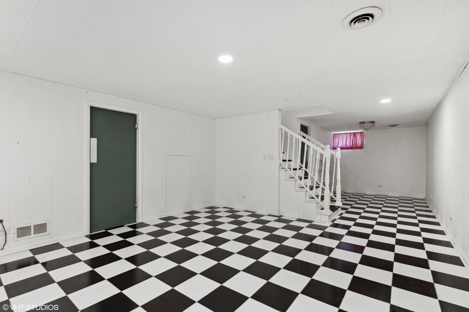 106 Lloyd Street Cary, IL 60013 - Photo 12 of 14 a black and white checkered floor