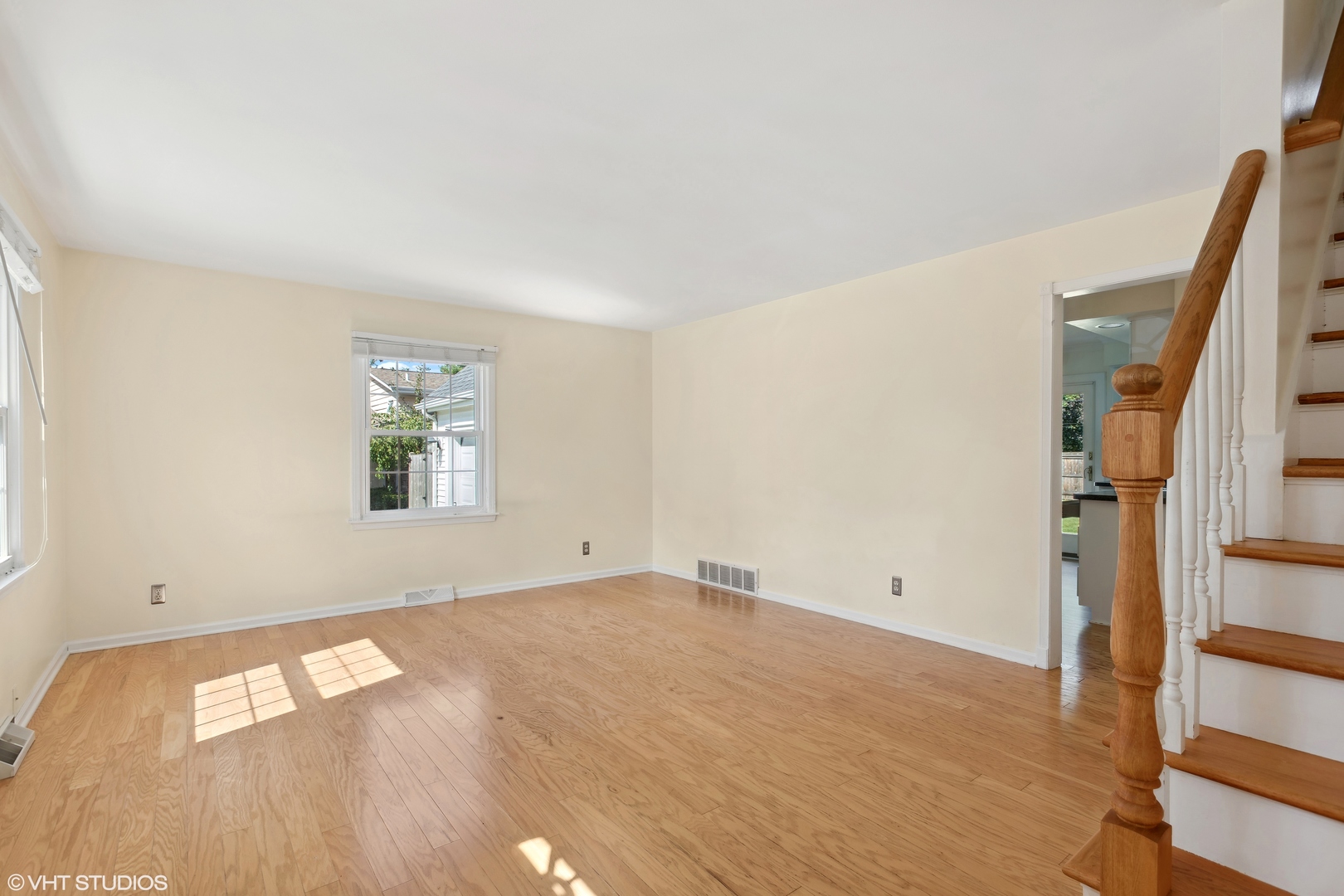 106 Lloyd Street Cary, IL 60013 - Photo 4 of 14 an empty room with windows