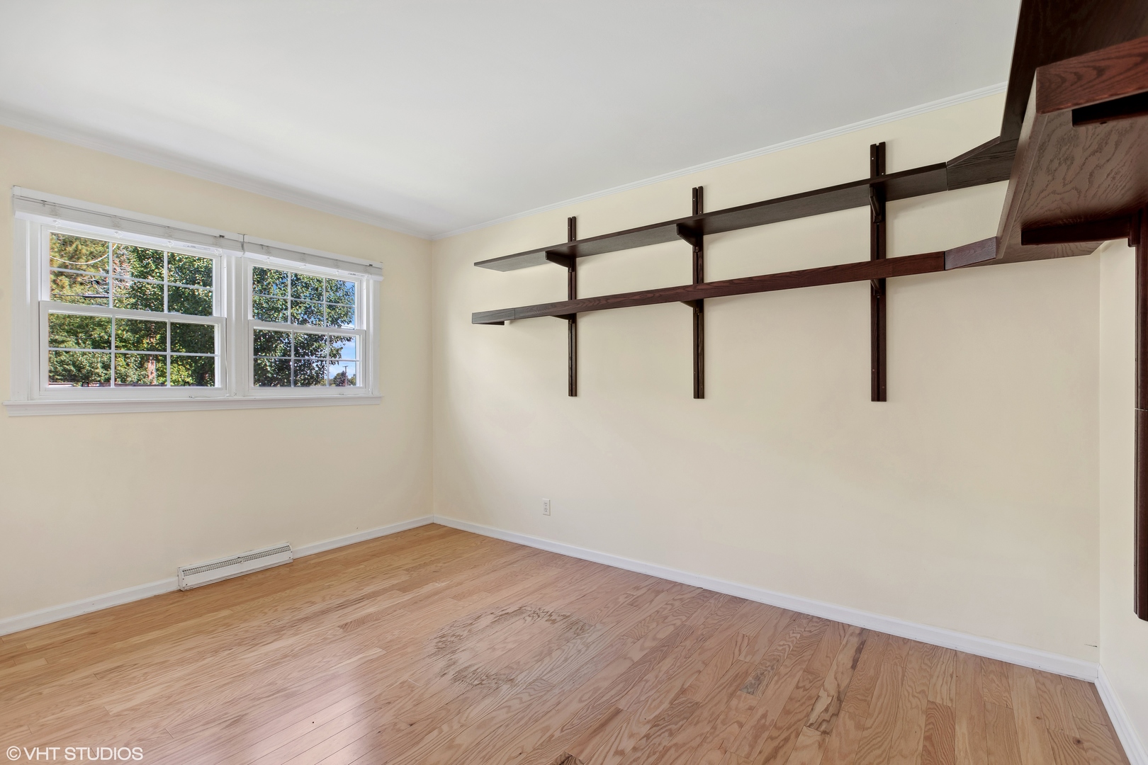 106 Lloyd Street Cary, IL 60013 - Photo 7 of 14 a view of a room with wooden floor and window