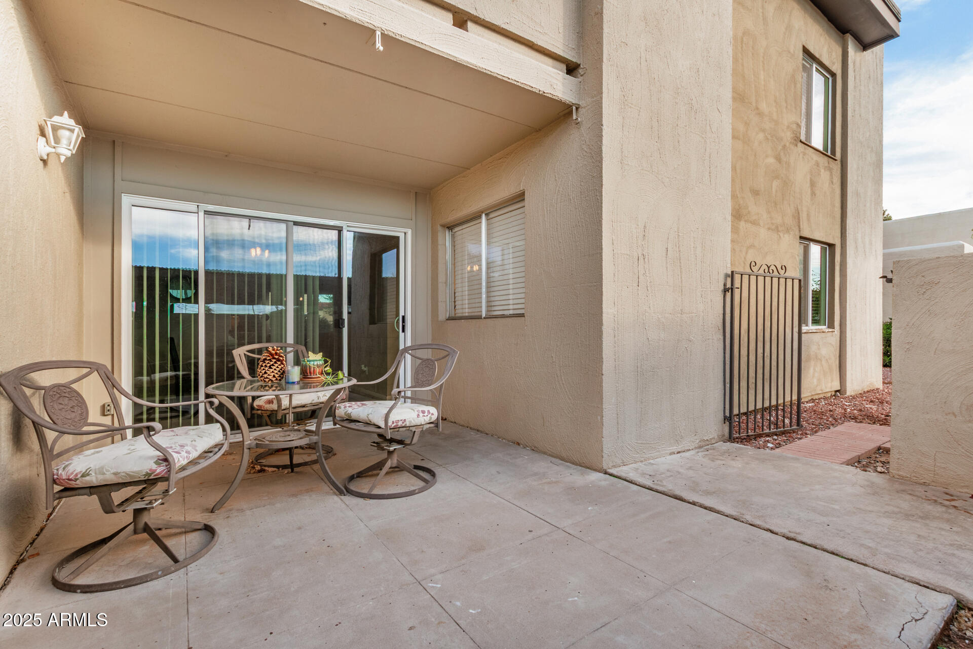 4201 East Camelback Road, Unit 15 Phoenix, AZ 85018 - Photo 26 of 32 a view of a livingroom with lounge chair and windows