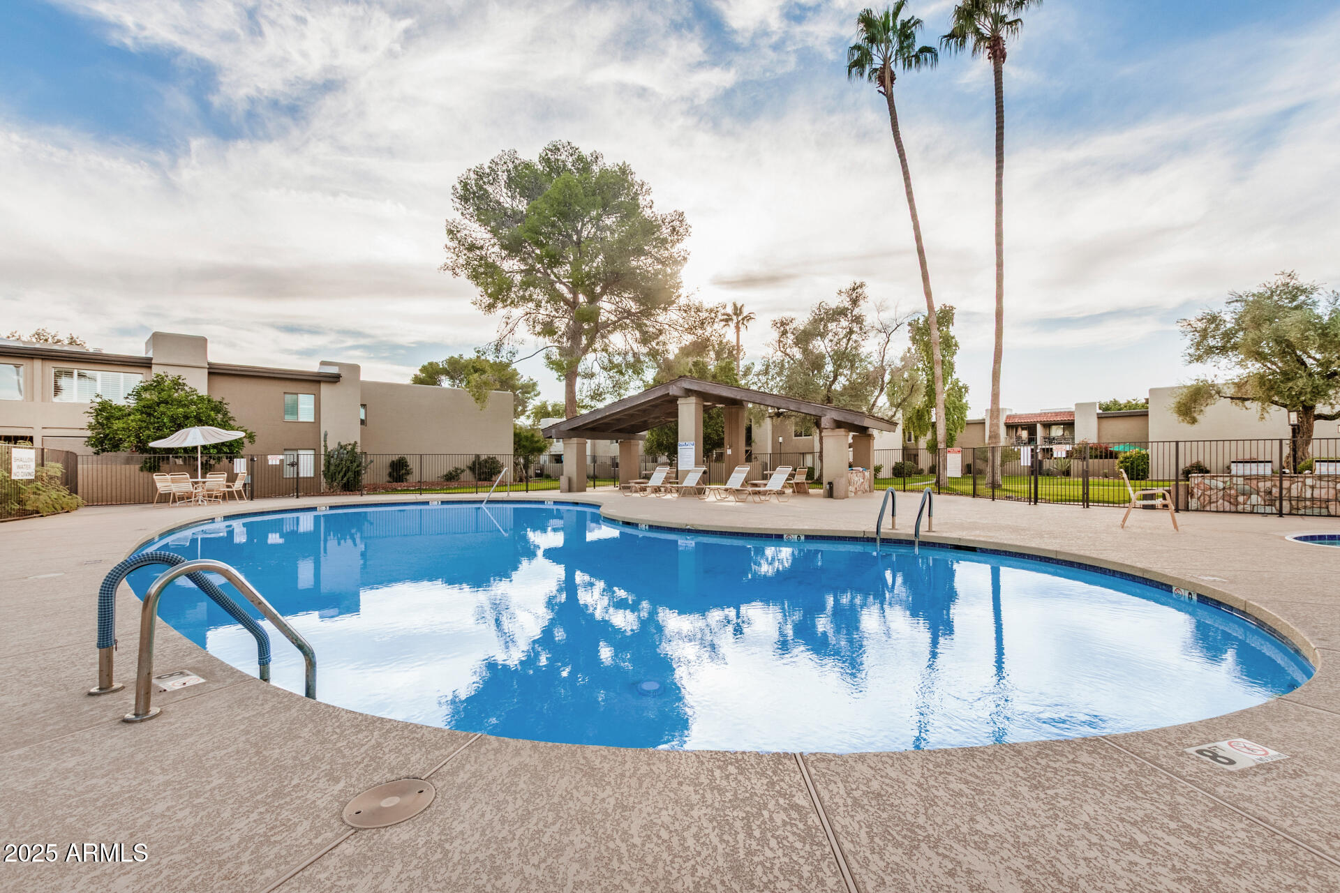 4201 East Camelback Road, Unit 15 Phoenix, AZ 85018 - Photo 32 of 32 a view of swimming pool with a terrace