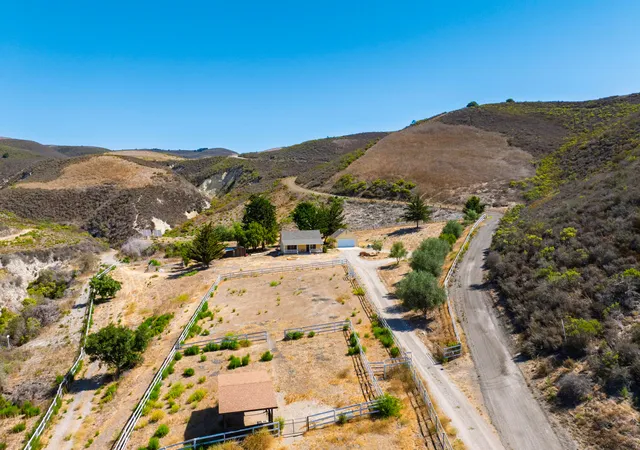 a view of a backyard with a garden
