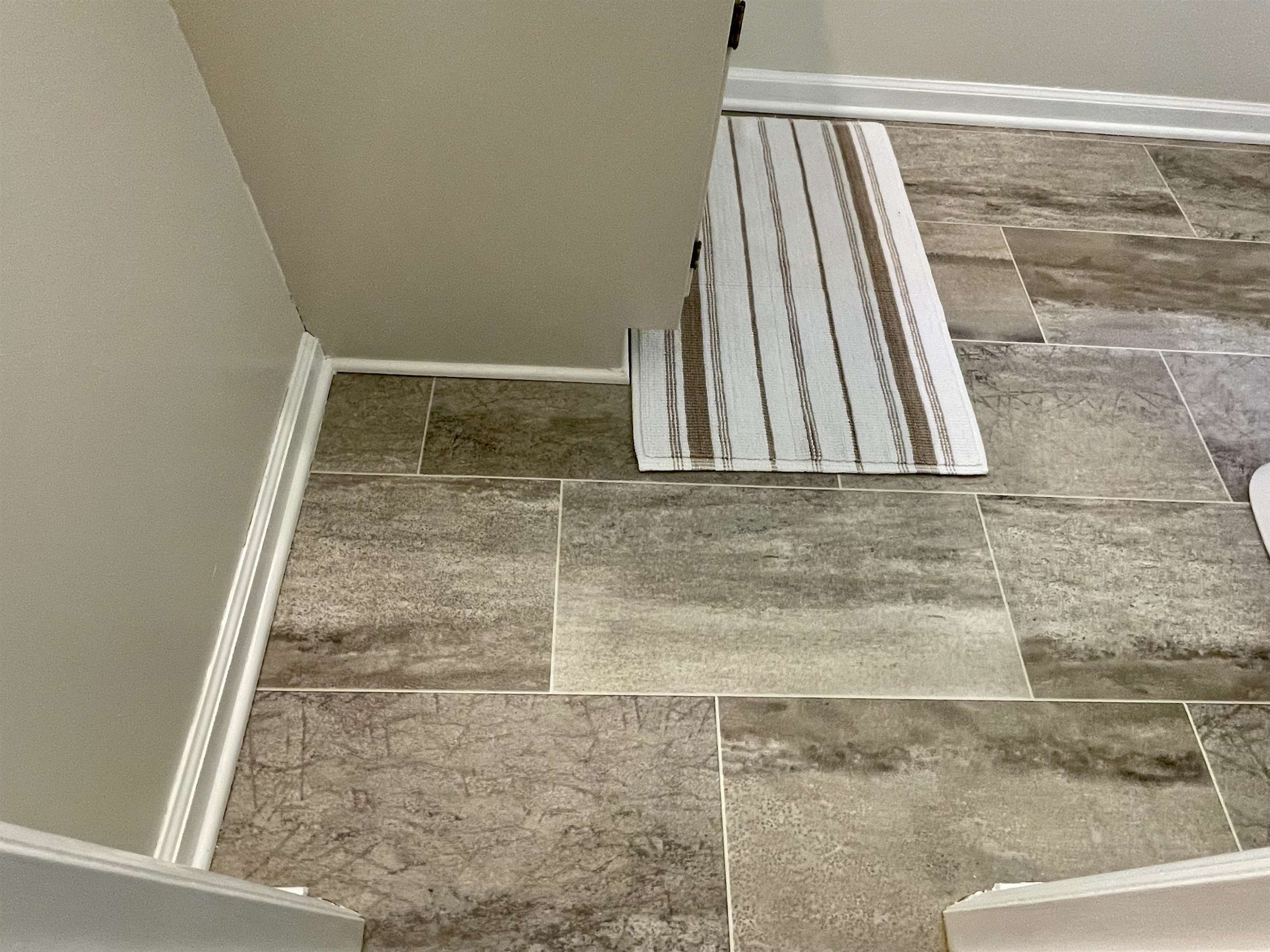 4506 Malvern Road Durham, NC 27707 - Photo 37 of 40 Nearly new vinyl "tile" in downstairs bathroom. Bathroom