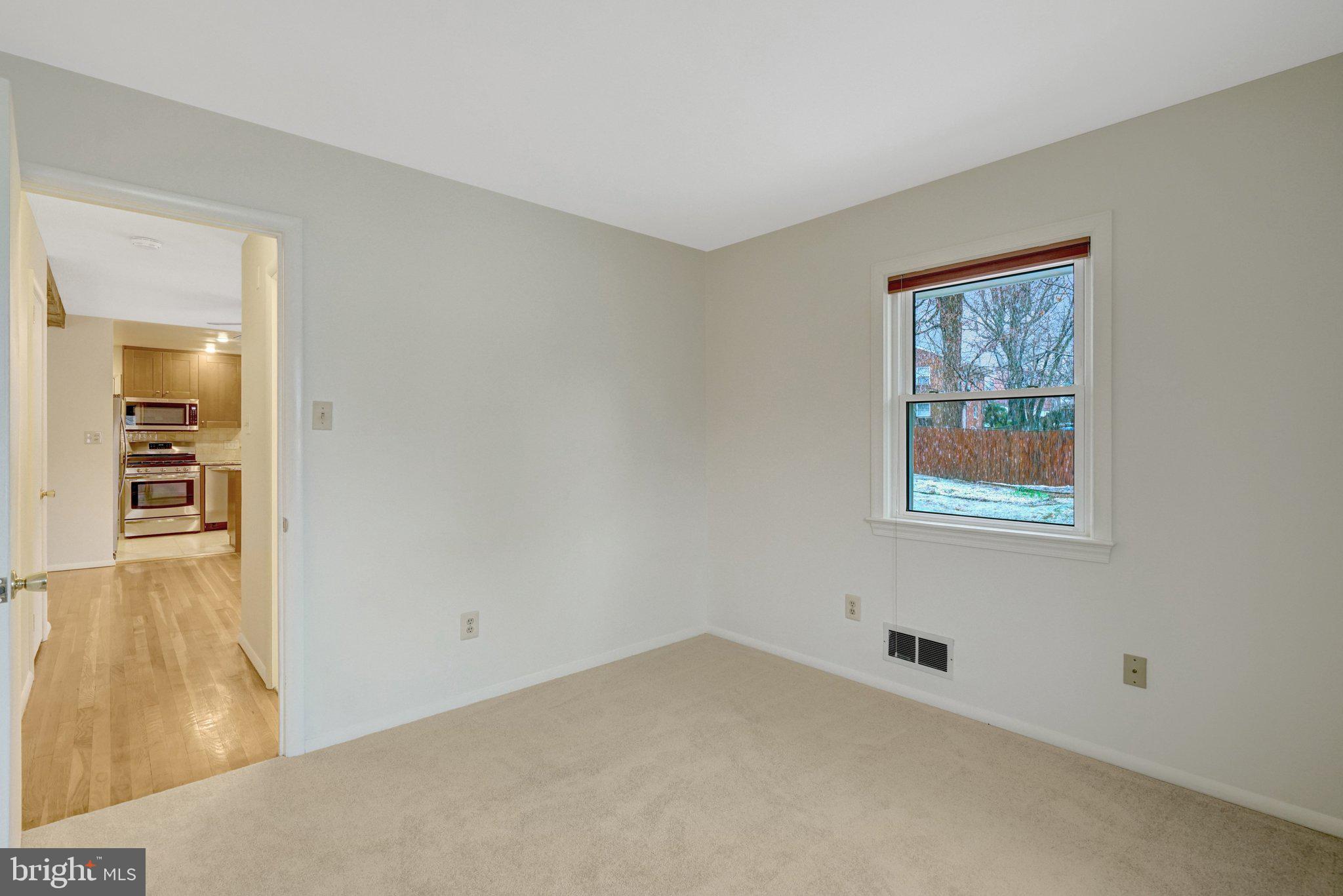 5417 Juliet Street Springfield, VA 22151 - Photo 16 of 46 a view of an empty room with a window