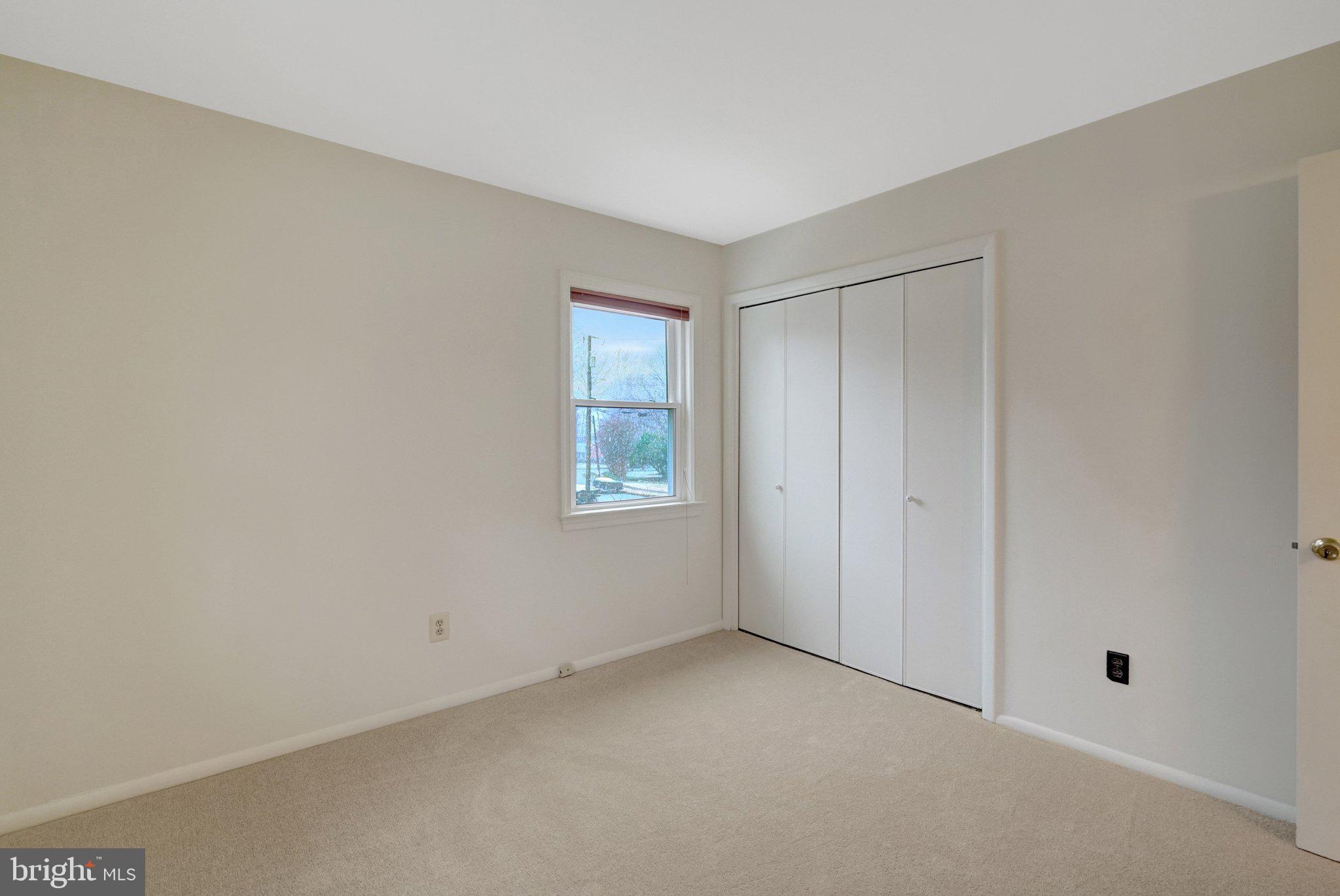 5417 Juliet Street Springfield, VA 22151 - Photo 20 of 46 a view of an empty room with a window