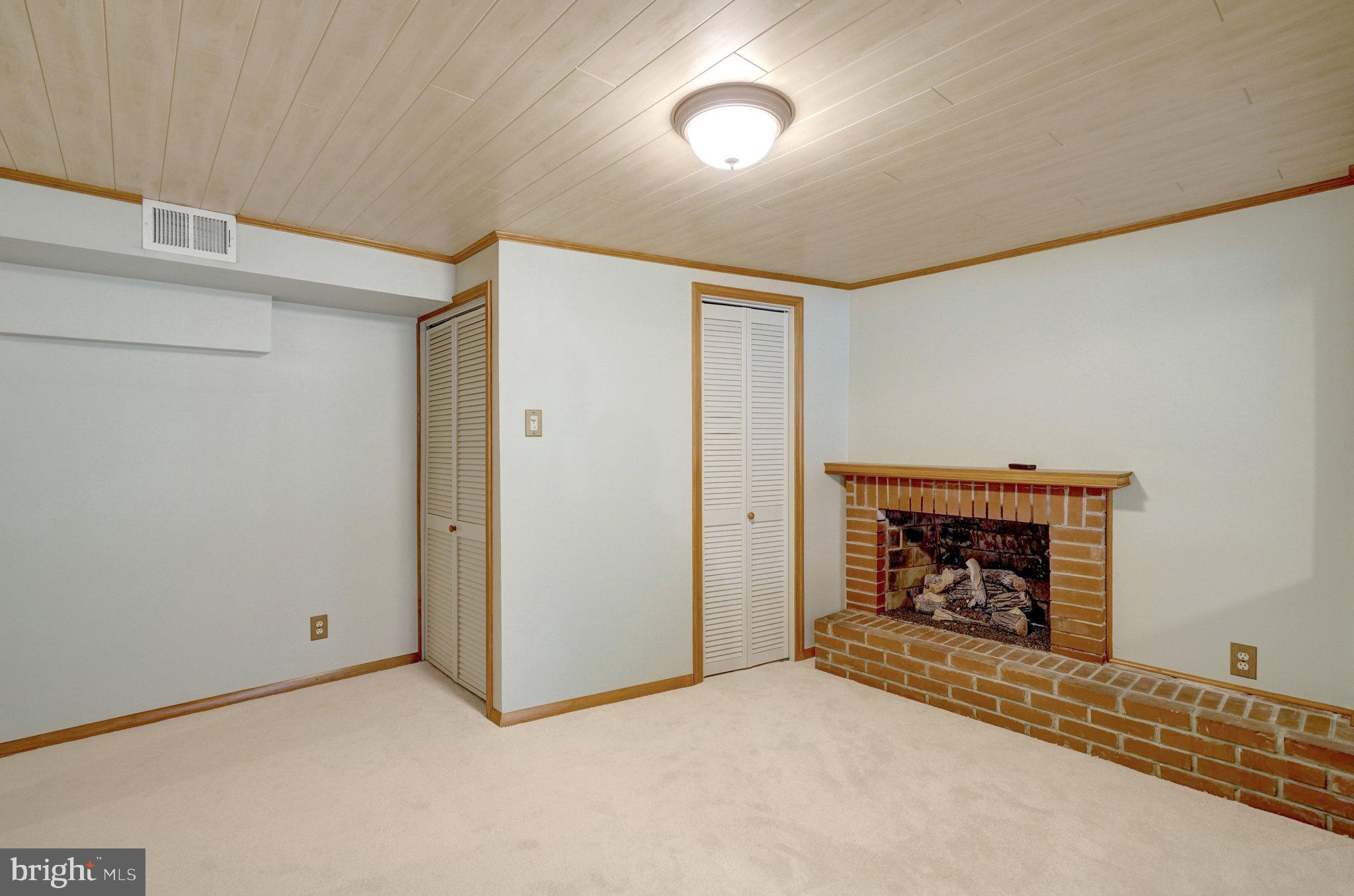 5417 Juliet Street Springfield, VA 22151 - Photo 29 of 46 a view of an empty room with a fireplace